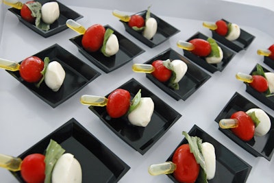 Many of the events during the Republican National Convention will be receptions, where networking is the focus and the food needs to be portable. One of the items Good Food Catering Company will serve is a Caprese skewer on a pipette of extra-virgin olive oil.