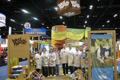Antlre Creative designed a recent West Paw Design trade show booth, including flooring, signage, and staff outfits, to be as eco-conscious as possible. Bender Brothers manufactured the cardboard elements using solar-powered machinery.