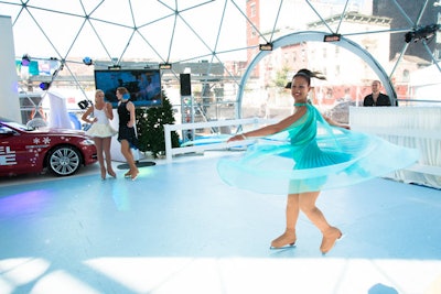 Professional figure skaters are on site to interact with guests and give skating lessons.