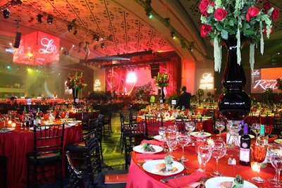 Flowers are a quick and simple way to add the color of your choice to event decor. At the Target Leukemia Ball in Washington in 2009, Exquisite Design Studio created oversize arrangements for some of the dining room tables.