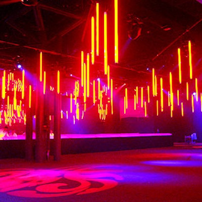 Exposed lighting adds to the color and the decor. At the Robin Hood Foundation's gala in 2003, event designer Avi Adler hung red tubular fluorescent lightbulbs over the cocktail area inside New York's Jacob K. Javits Convention Center.