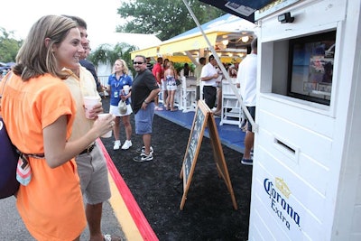 Next to the beach bar, Corona set up a photo booth where guests could email or post pictures to Facebook directly from the machine.