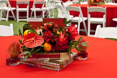 The 650 floral pieces were created by ConceptBAIT. There were nine different designs, each one incorporating citrus fruit, such as tangelos and navel oranges, embedded in a tropical arrangement inside a cigar box. For four days prior to the event the company's designers created the arrangements at a nearby hotel. Early Sunday morning the flowers were brought to Tropicana Field and sprayed with water every hour to keep them fresh until guests arrived in the evening.