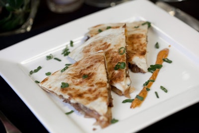 Convention goers will dine on crispy, pressed quesadilla triangles filled with steak, Gorgonzola, and caramelized red onions.