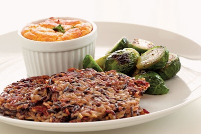 Sweet potato souffle with roasted Brussels sprouts, maple syrup, and wild rice latkes, by FIG Catering in Chicago