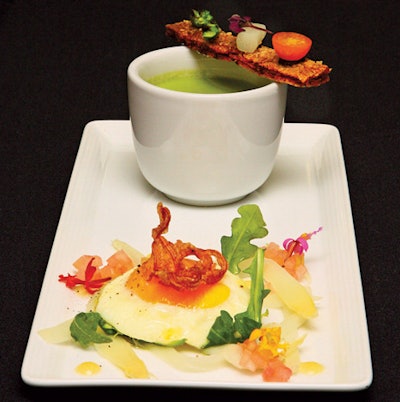 Duo of green asparagus soup with a pancetta-wrapped Parmesan crostini and white asparagus salad with pickled watermelon rind, crispy pig skin, and fried egg, by Wolfgang Puck Catering & Events in Los Angeles