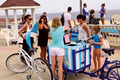 Brand ambassadors rode customized bikes mounted with coolers to carry the water.
