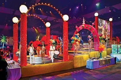 A 60-foot-long, multitiered stationary float covered with glittering fabric was the central decor piece at the Recording Academy’s Grammy Celebration in Los Angeles in February. Decor elements soared to 25 feet in the air from the structure, which doubled as a two-sided projection screen and carried 30 costumed performers, dancers, and drummers.