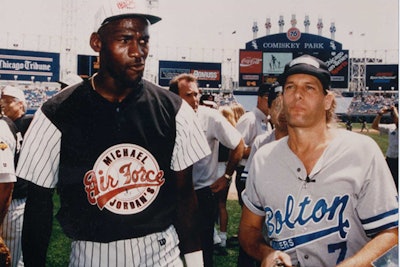 Michael Jordan and Michael Bolton play charity softball.