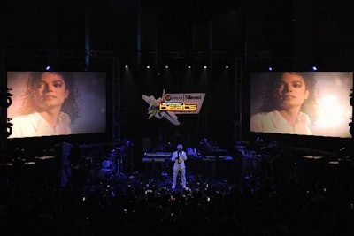 During performances by Ne-Yo (pictured), Melanie Fiona, Swizz Beatz, and DJ Cassidy, photos of Michael Jackson were splashed across the screens onstage.