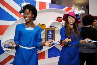 Staffers handed out bars from sponsor Luna in front of a giant Union Jack wall.