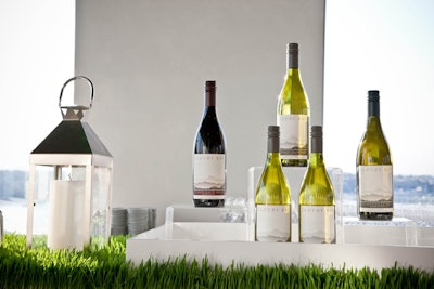 A tasting bar displaying the wines from the New Zealand winery was topped with wheatgrass.