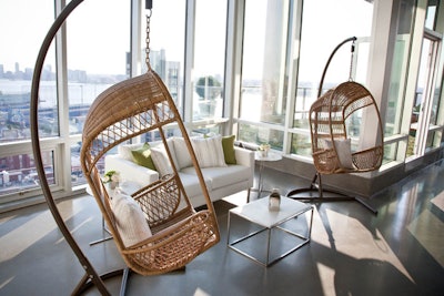 Inside the modern, minimalist space of the Glasshouses, Cloudy Bay looked to create a softer, more organic feel with a palette of green and white. White furnishings mixed with wicker chairs provided a clean but warm feel to the seating areas.