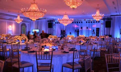 Romantic uplighting with Drape Kings’ white sheer