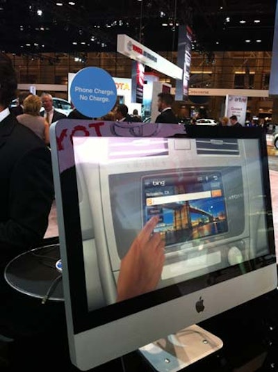 Toyota’s exhibit area at the Chicago Auto Show included Apple desktop computers that functioned as charging stations and displayed Toyota commercials to keep visitors entertained.