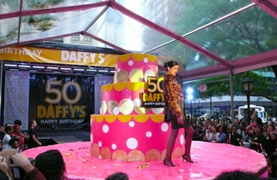 To celebrate its 50th anniversary last year, designer discount retailer Daffy's hosted a 'cakewalk' in Greeley Square Park, where models showed off 23 fall looks, walking around—and on top of—a four-tiered, 10-foot birthday cake created by Vincent Buzzetta of WE TV's Staten Island Cakes.
