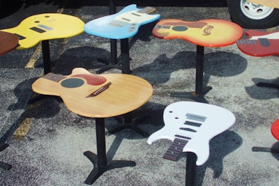 Add a rock 'n' roll vibe to your event with new tabletops from Max King Events that are replicas of acoustic and electric guitars. The tops can be used on 30- or 42-inch stands. The handcrafted tabletops are available in 12 designs. Prices start at $85.
