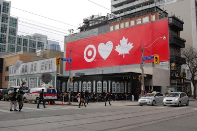 An enormous billboard made it hard to miss Target's Toronto pop-up store, the Minneapolis retailer's first event in Canada. The bright red sign combined Target's logo and colors with that of the Canadian flag, and marked the site of the temporary store for the Jason Wu collection on King Street West.