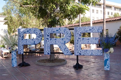 Matching the color scheme in the cocktail space, large letter-shaped structures bookended by blue and white flowers marked the arrivals area of the 2012 BET Awards preshow dinner in Los Angeles.