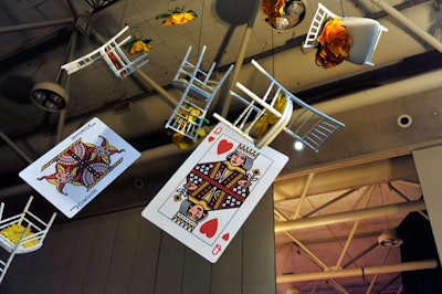 In the Bell Gala's after-party space, giant playing cards, chairs, and flowers were suspended from the ceiling.
