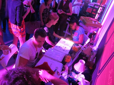 As part of the Fashion's Night Out festivities last September, Paul Frank took over a space on Beverly Boulevard in Los Angeles. Guests got henna and glitter tattoos, scooped up candy at the bar, and listened to beats from DJ Taryn Manning.