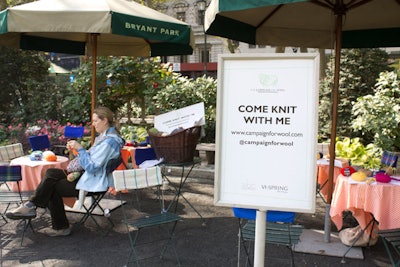 Signage invited passersby to take a seat and knit.