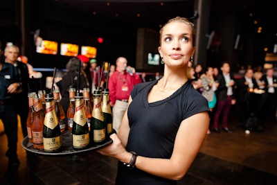 Servers circulated with mini bottles of champagne and sparkling rosé in Real Sports.