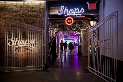 Using the ad campaign for the fall installment of the Shops at Target as its design springboard, ExtraExtra sought to create a street scene within the raw venue, marking the entrance to the main space with metal gates and a hallway framed by tree-shaped cutouts.