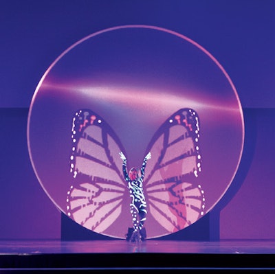 At this year's Prudential Real Estate's conference in Orlando, Dallas-based Corporate Magic paired live dancers with digitized butterfly wings projected inside floating orbs to create a single, fluid movement of person and pixels onstage. In-house animators achieved the effect by using green-screen technology. Prices start at $10,000.