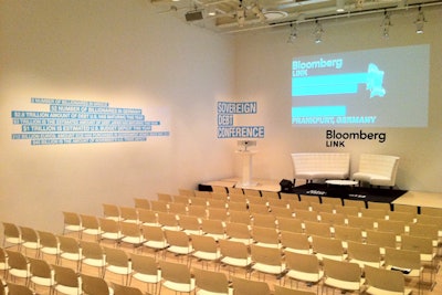 Conference setup — clients can brand or project on theater walls