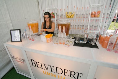 Belvedere vodka's sleek tent had an illuminated bar and billowing white drapes. Fresh citrus fruits were displayed to highlight the brand's vodka flavors Lemon Tea and Pink Grapefruit.