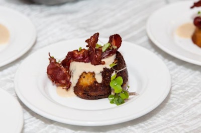 The Atlantis Event Complex's in-house catering handled most of the food for the event. The menu for each room was tailored to reflect the Element theme. Pictured here is a Sour cherry and molasses souffle with duck bacon and blue cheese foam.