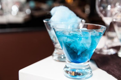 Mixologists were on hand to shake up specialty cocktails for each room. Pictured above is a martini from the Water room. Guests enjoyed blue cotton candy that was made on-site and served in martini glasses.