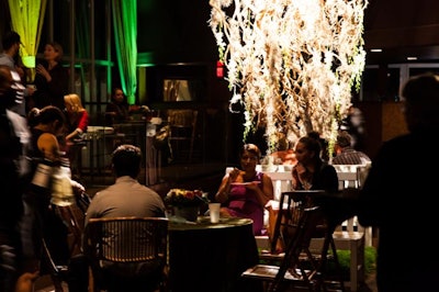 A tree created with inverted manzanita branches and embellished with candy apples was the centerpiece of the Earth room.