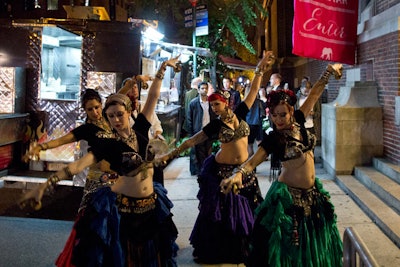Outside the venue, belly dancers provided entertainment and helped catch the attention of passersby.