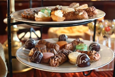 A desert spread served to planners included cannoli, mini cupcakes, macarons, and cake balls.