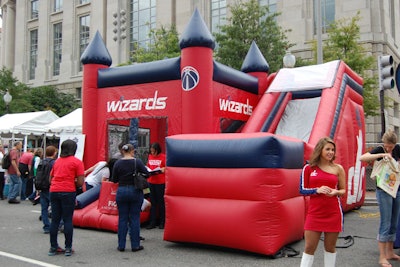 The Washington Wizards provided a branded space walk and slide in the Family Zone on Pennsylvania Avenue near 14th Street, along with photo ops with its cheerleaders.