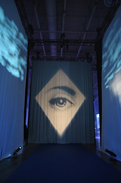 Vincent Drolet of Circo de Bakuza wanted to create a buffer zone between the real world and the event's surreal setting. At the entrance, guests walked through a curtain and were greeted with a projection of an eye that opened and closed. 'We wanted to give them the feeling of walking into a cloud,' said Drolet.
