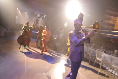 To lead the guests from the cocktail space into the dining room, a band followed the roving Dream Machine.