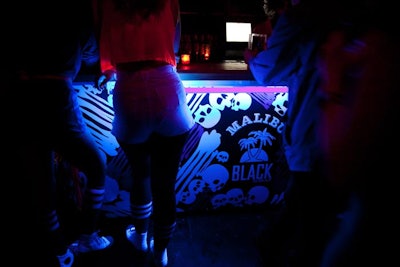 Last year's Malibu Rum launch for its Black spirit filled New York's Good Units with Halloween-inspired decor. Even the bars matched the look, with black lights and skull-and-crossbones imagery at one and plasma balls on foil-covered shelves at another.