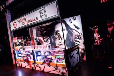 A concession stand distributed three varieties of popcorn, boxes of movie candy, and Target beauty products.