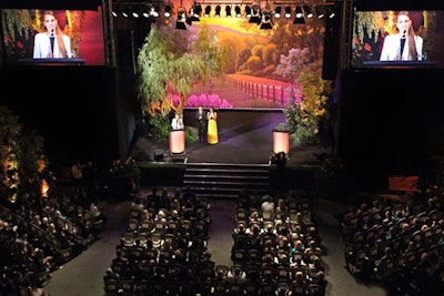 Guests gathered for the Environmental Media Awards in an alfresco, theater-style setup on the Warner Brothers lot, where the stage set evoked the French countryside.