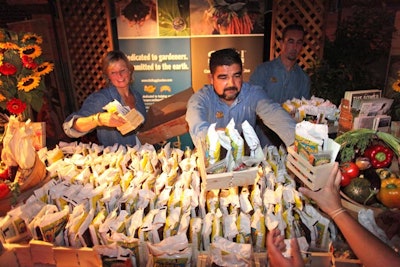 Guests scooped up organic soil and seeds at one of the gifting stations at the party.