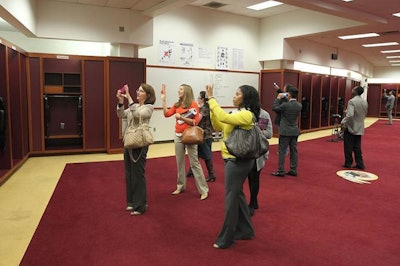 Part of the V.I.P. tour was a visit to the Washington Redskin's player and coach locker rooms. Planners were able to pose for photo ops with the lockers of their favorite players and sit at the coach's desk.