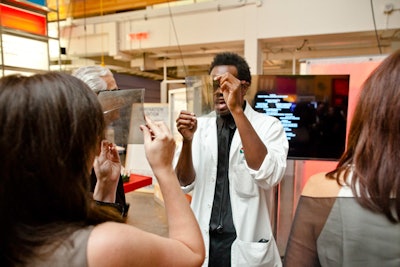 Science Centre staffers in lab coats circulated the event with small science experiments for guests to explore, like the effect of polarized lenses.