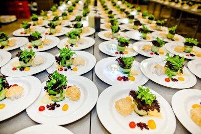 Marigolds and Onions created a menu that matched the space-aged theme. LED lights flashed from under a Parmesan nest for the first course, a 'Rocket Salad' served with dehydrated cranberries.