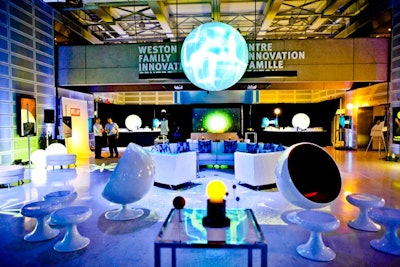 The cocktail reception returned to the Weston Family Innovation Centre this year after taking over the Great Hall last year. Retro ball chairs, a circular lounge, and a hanging globe added to the 'Fly Me to the Moon' theme.