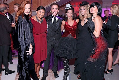 Guests, including special auctioneer Tommy McFly (pictured, center), donned their best 'Dracula Chic' as per the invitation's requested dress code.