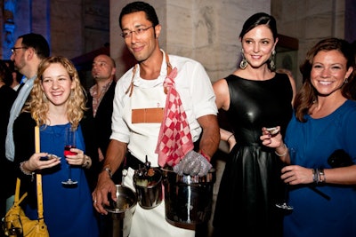 Mobile oyster shuckers from Oysters XO circulated through the crowd carrying buckets of oysters on ice around their waists. The servers were also equipped with containers of various sauces and buckets for empty shells.