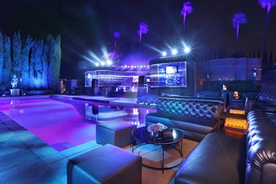 By the pool, Event Eleven constructed a 20-foot round stage and built curved LED panels behind it to follow the contour of the pool house, showing custom graphics and imagery.